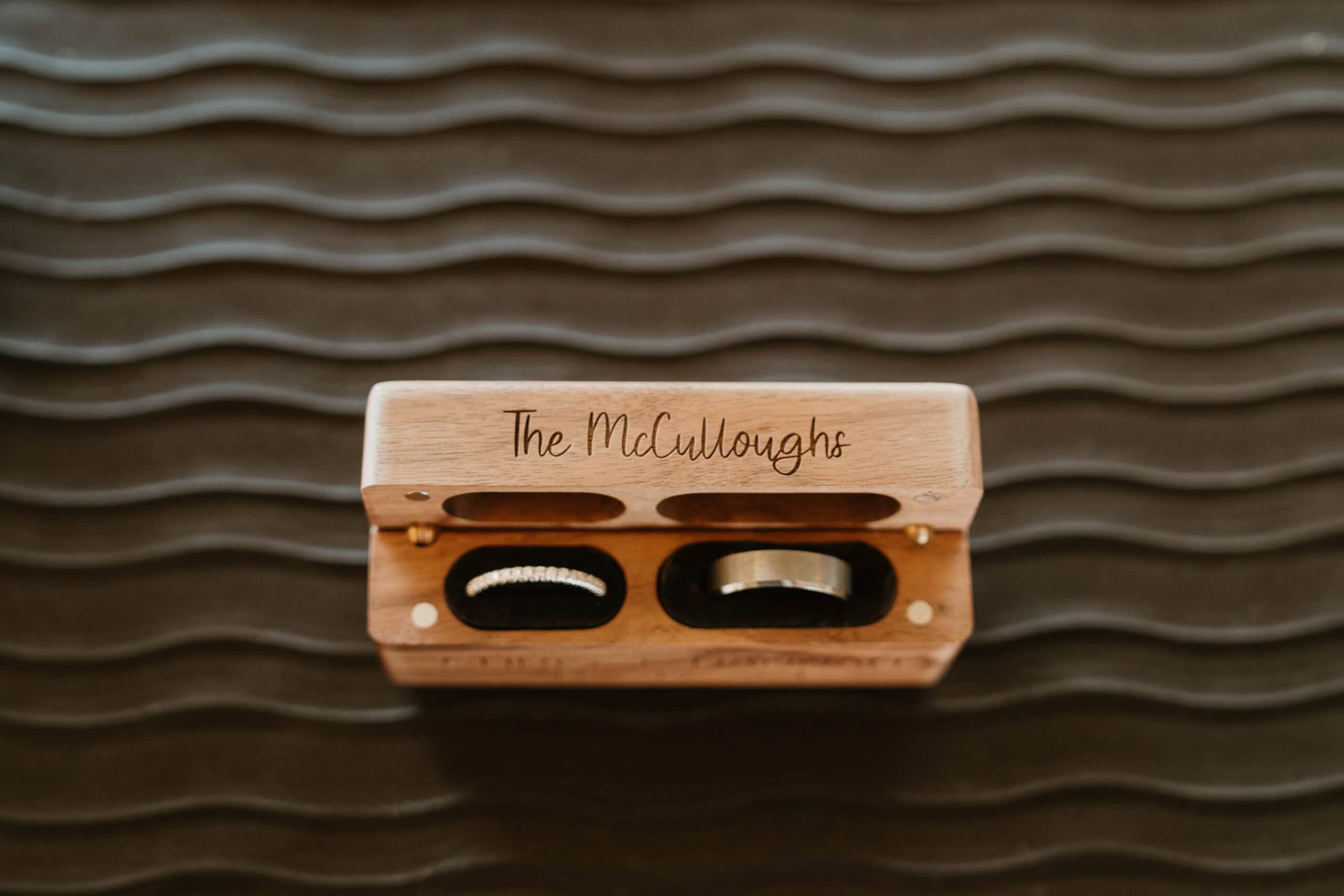 Custom wooden wedding ring box engraved with "The McCulloughs" for Virginia Beach wedding